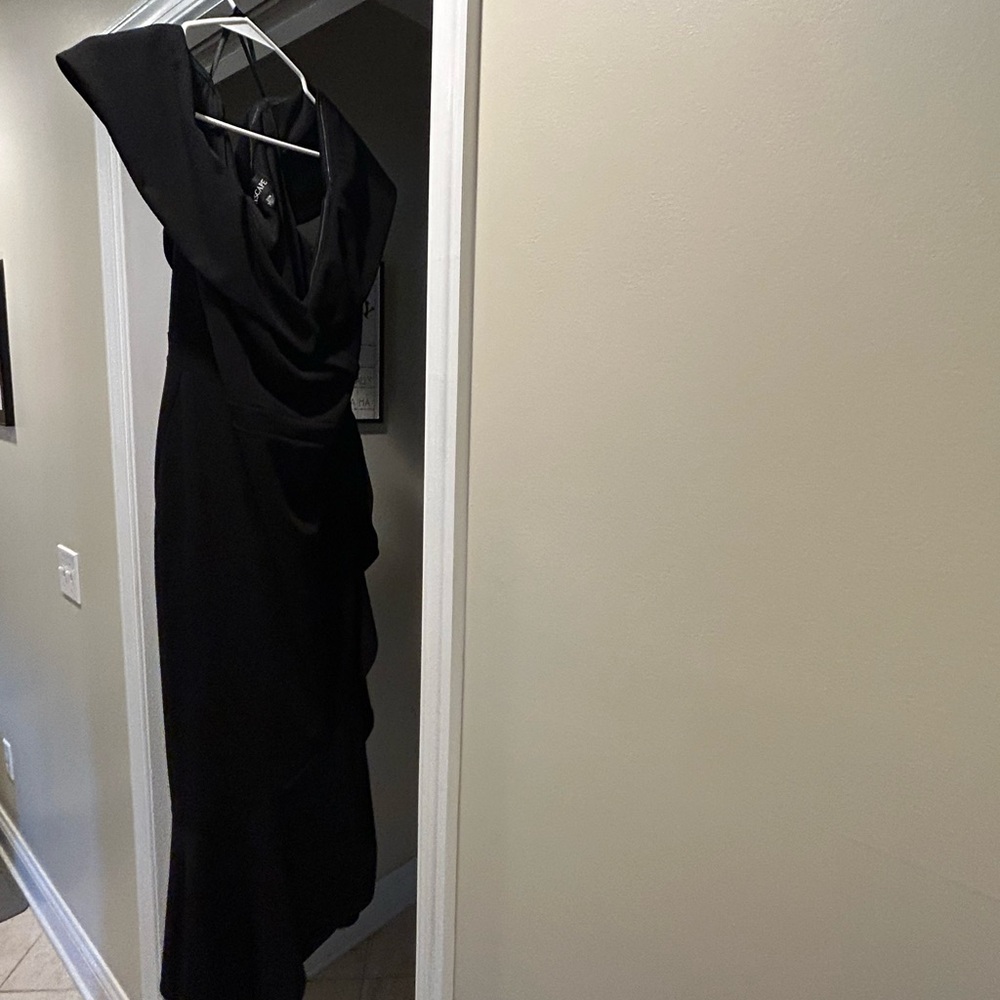 Escape Elegant Portrait Shoulder Black Evening Dress with V Neck.